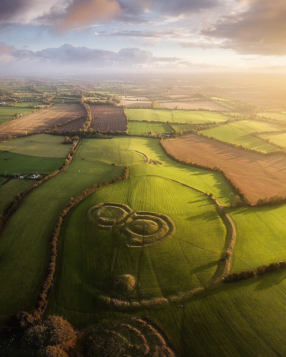 Aerial view of the Hill of Tara earthworks at sunrise
